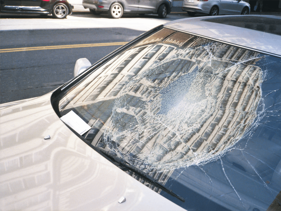 Close up of smashed windscreen of a car